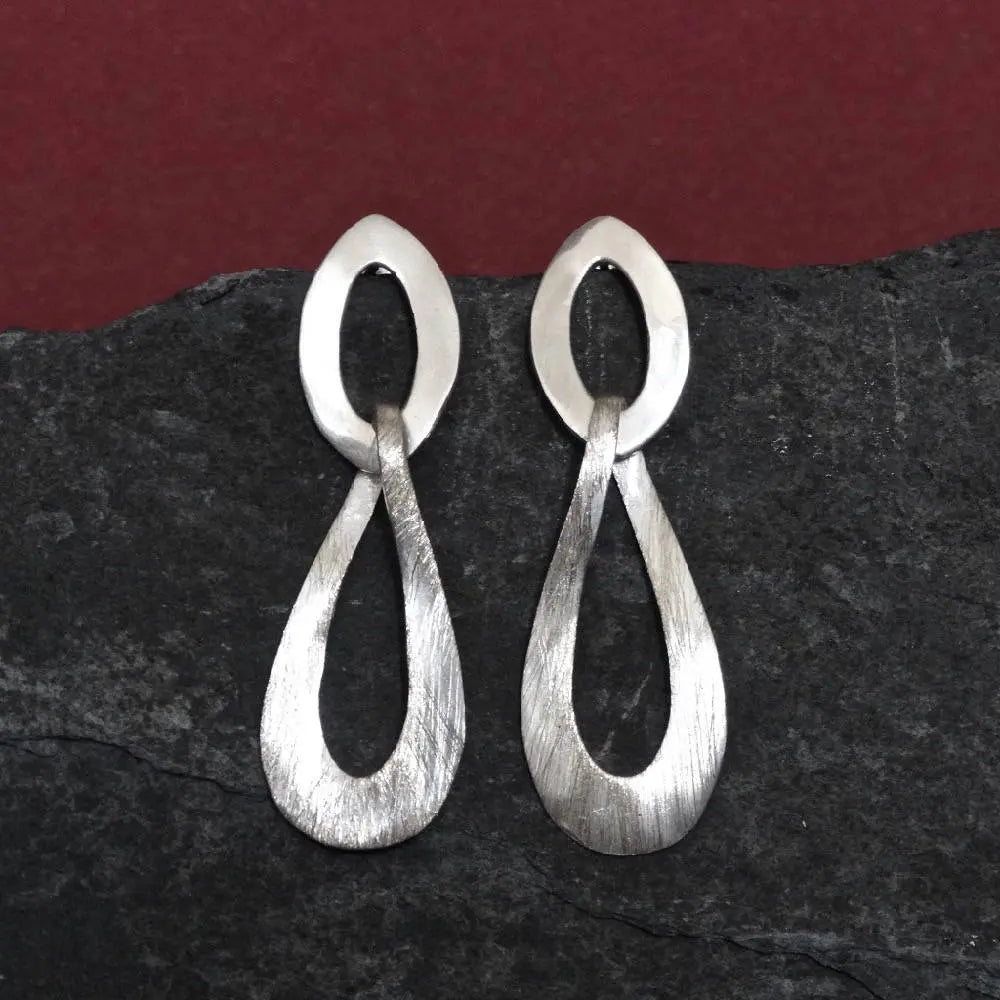 Sterling Silver Infinity Loop Drop Earrings – Beyond Biasa