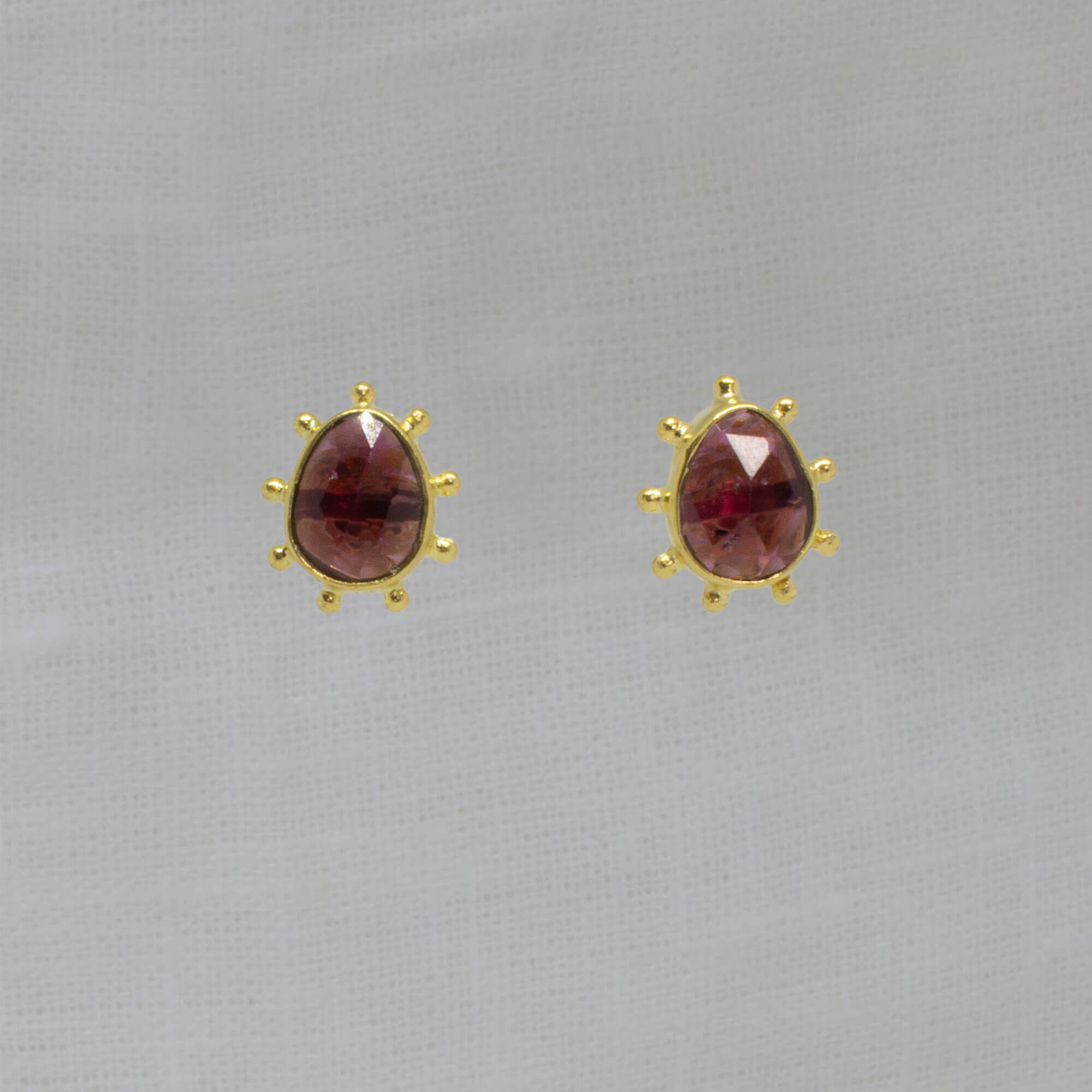 Garnet gemstone irregular organic stud earrings in an 18k gold vermeil dot work setting - Beyond Biasa