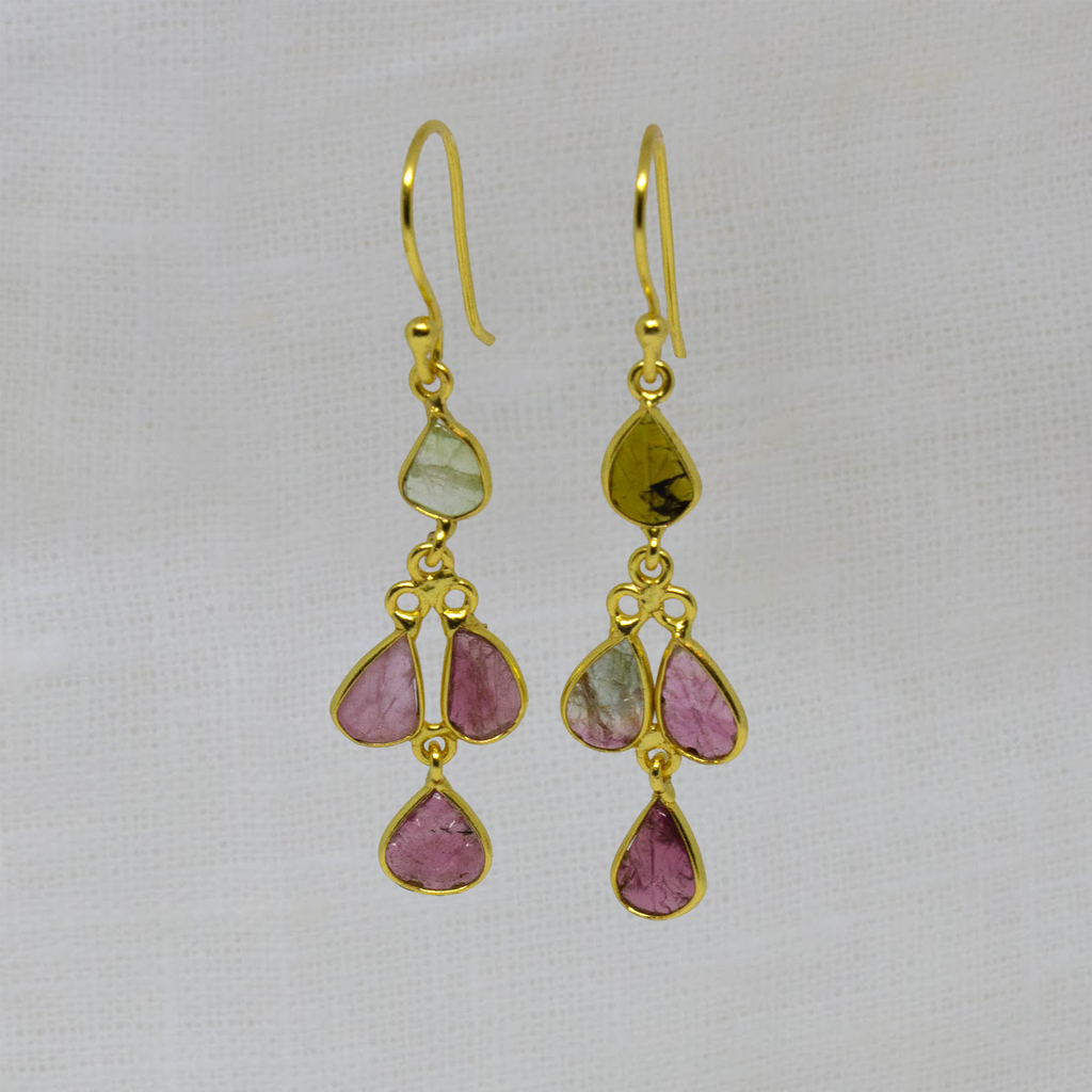 Drop earrings featuring 4 small leaf shaped carved tourmaline gemstones in a simple 18k gold vermeil setting, with a hook fitting