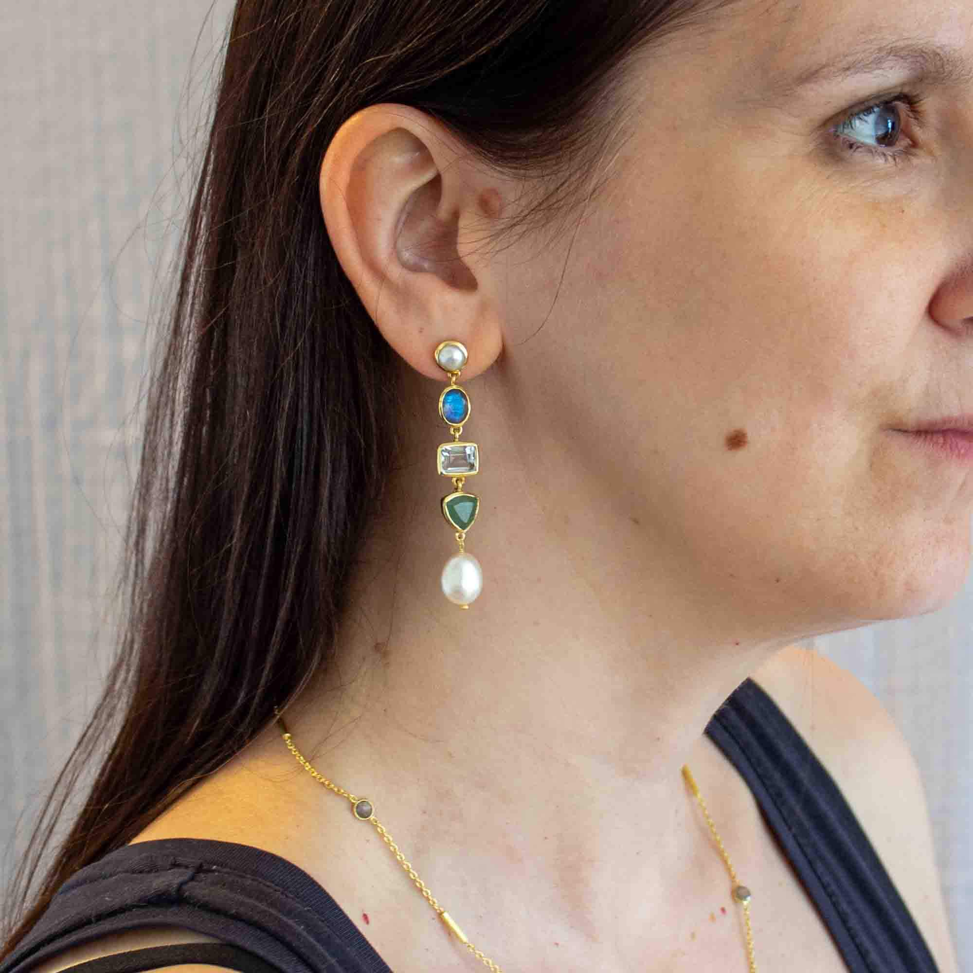 Model wearing Long gemstone multi stone dangle earrings in 18k gold vermeil, with freshwater pearl, labradorite, green amethyst and aventurine - Beyond Biasa
