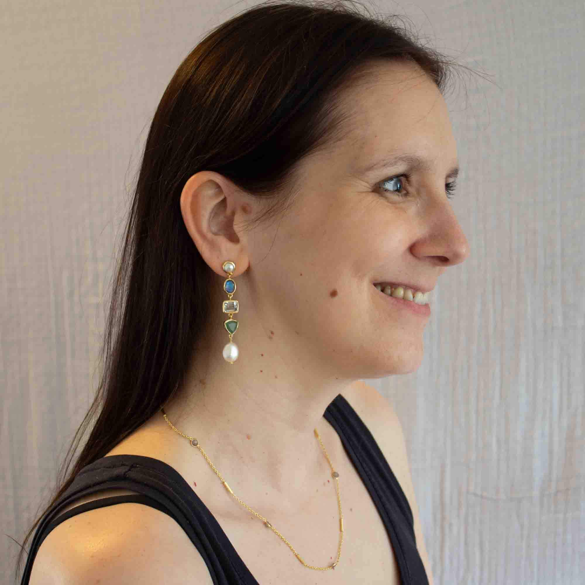 Model wearing Long gemstone multi stone dangle earrings in 18k gold vermeil, with freshwater pearl, labradorite, green amethyst and aventurine - Beyond Biasa