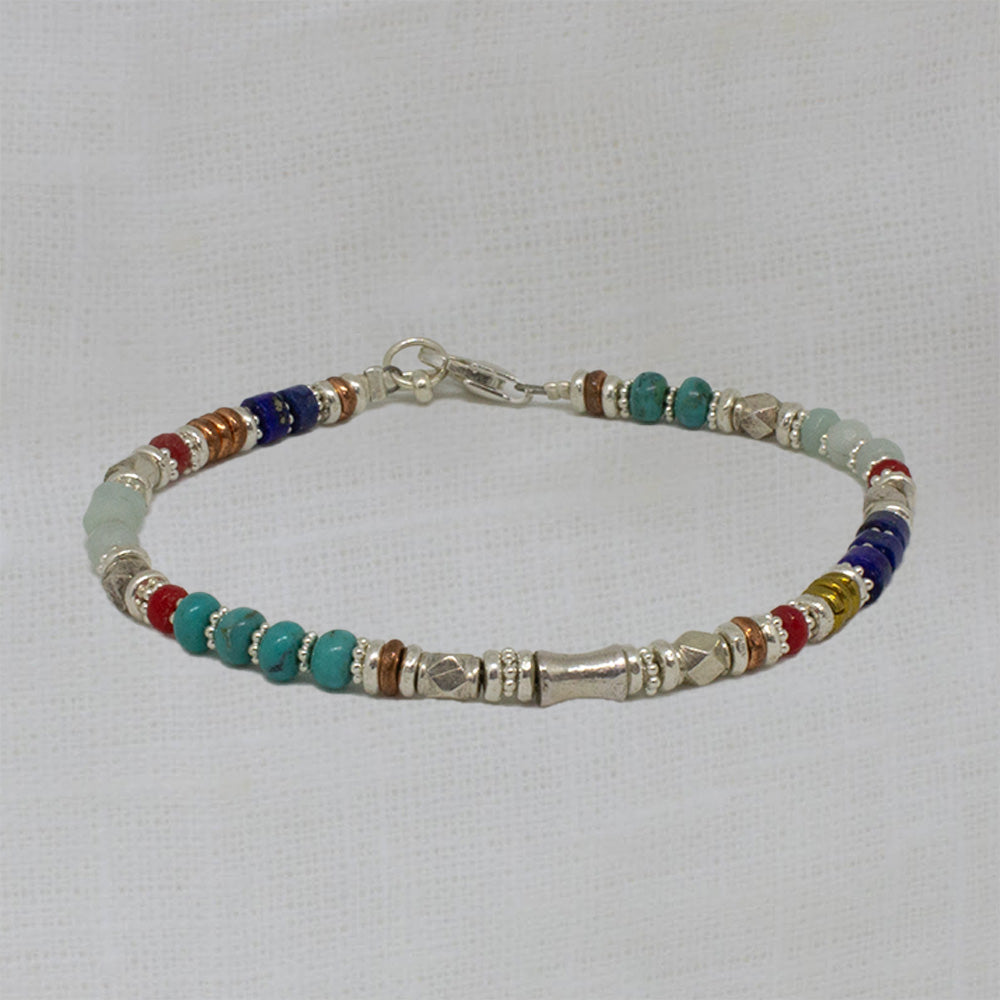 Semi-precious gemstone beaded bracelet with turquoise, lapis, amazonite and coral and silver, copper and brass - Beyond Biasa