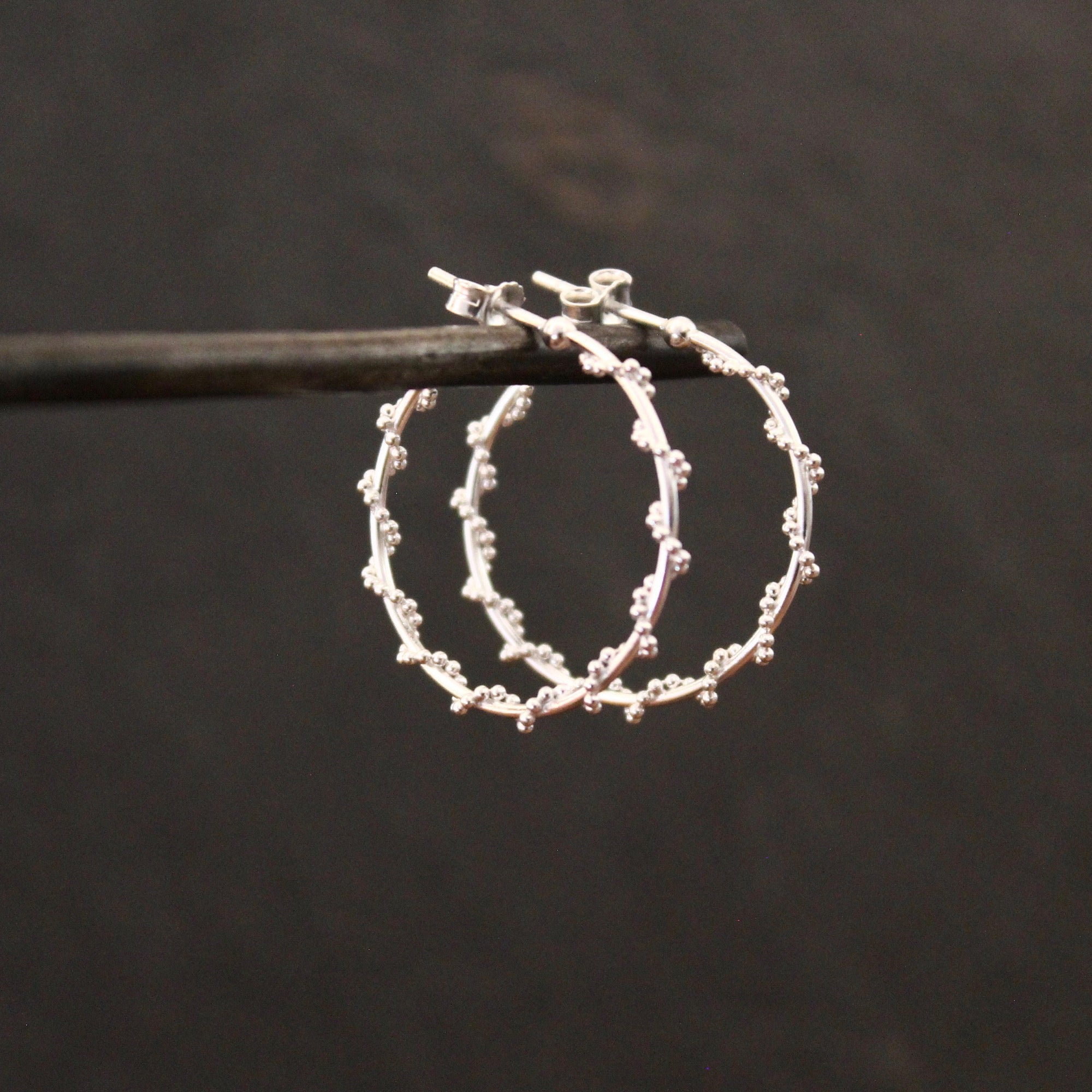 Sterling Silver Twist Hoop Earrings - Beyond Biasa