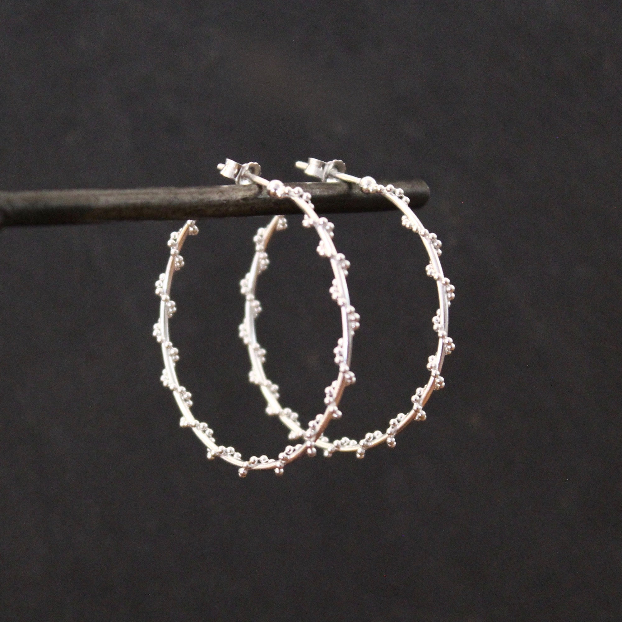 Sterling Silver Twist Hoop Earrings - Beyond Biasa