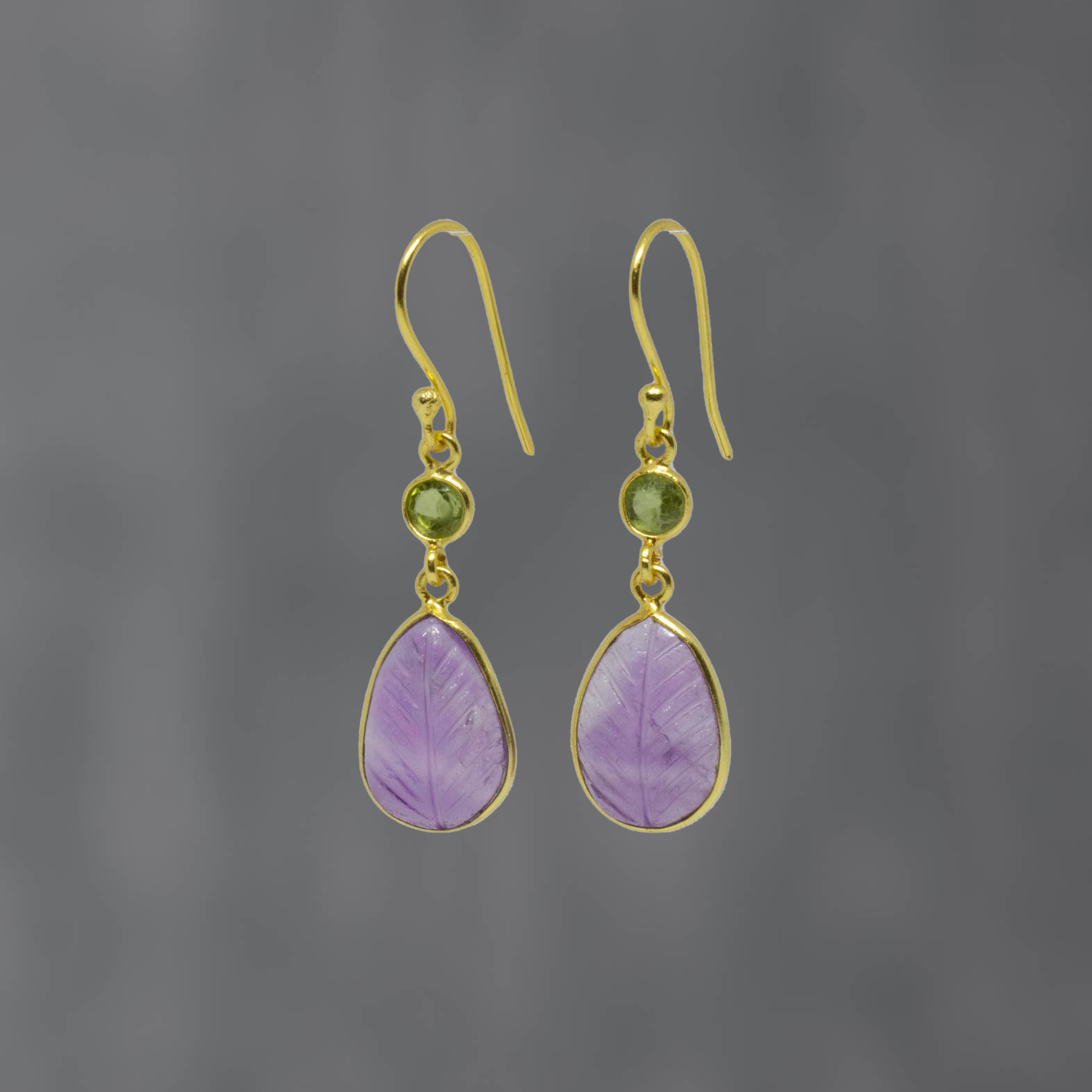 Carved teardrop amethyst gemstone earrings with small faceted peridot and gold vermeil hook fitting - Beyond Biasa