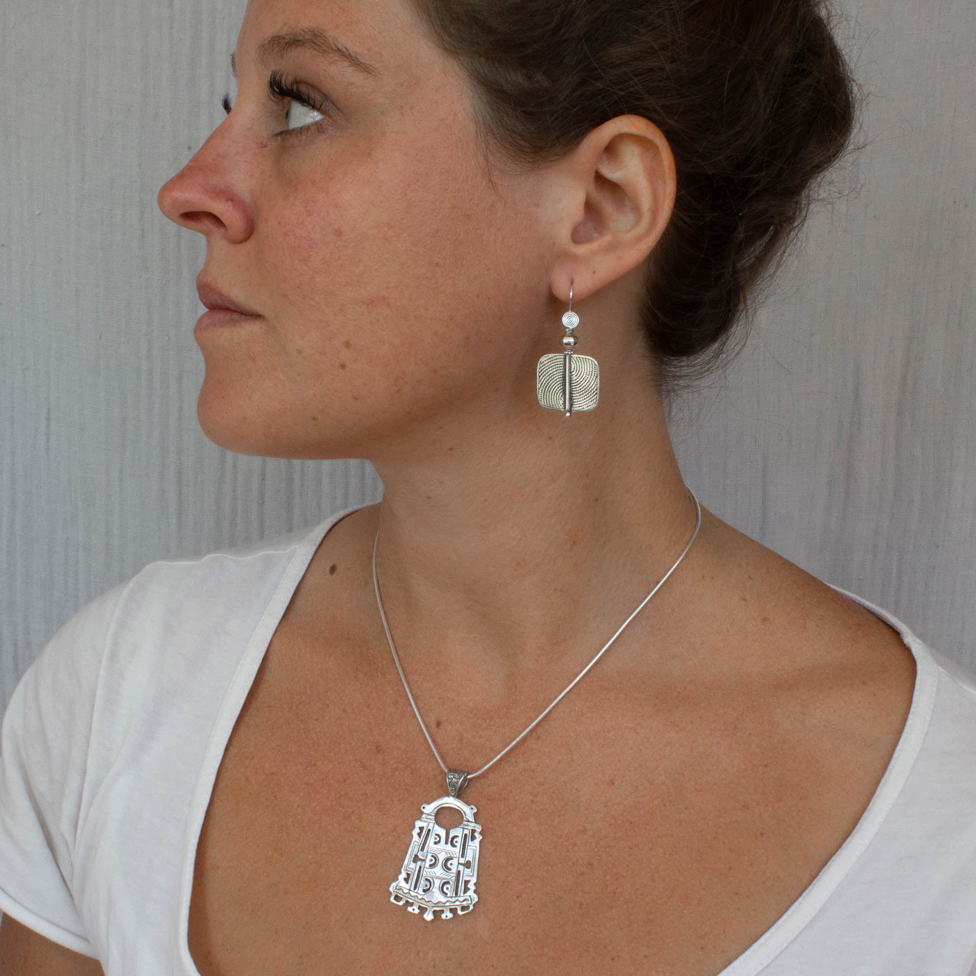 Model wearing Sterling silver large statement tuareg pendant necklace - Beyond Biasa
