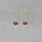 Long hook drop earrings in 18k gold vermeil with carved melon cut amethyst gemstones - Beyond Biasa