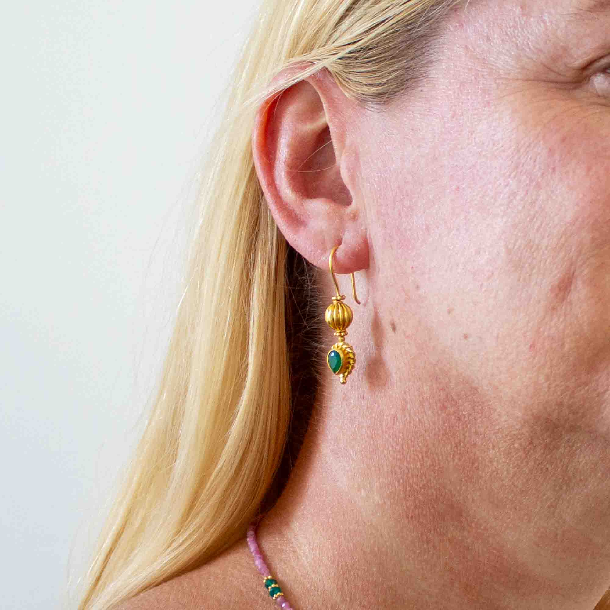 Model wearing Ornate 18k gold vermeil and green onyx gemstone drop earrings - Beyond Biasa