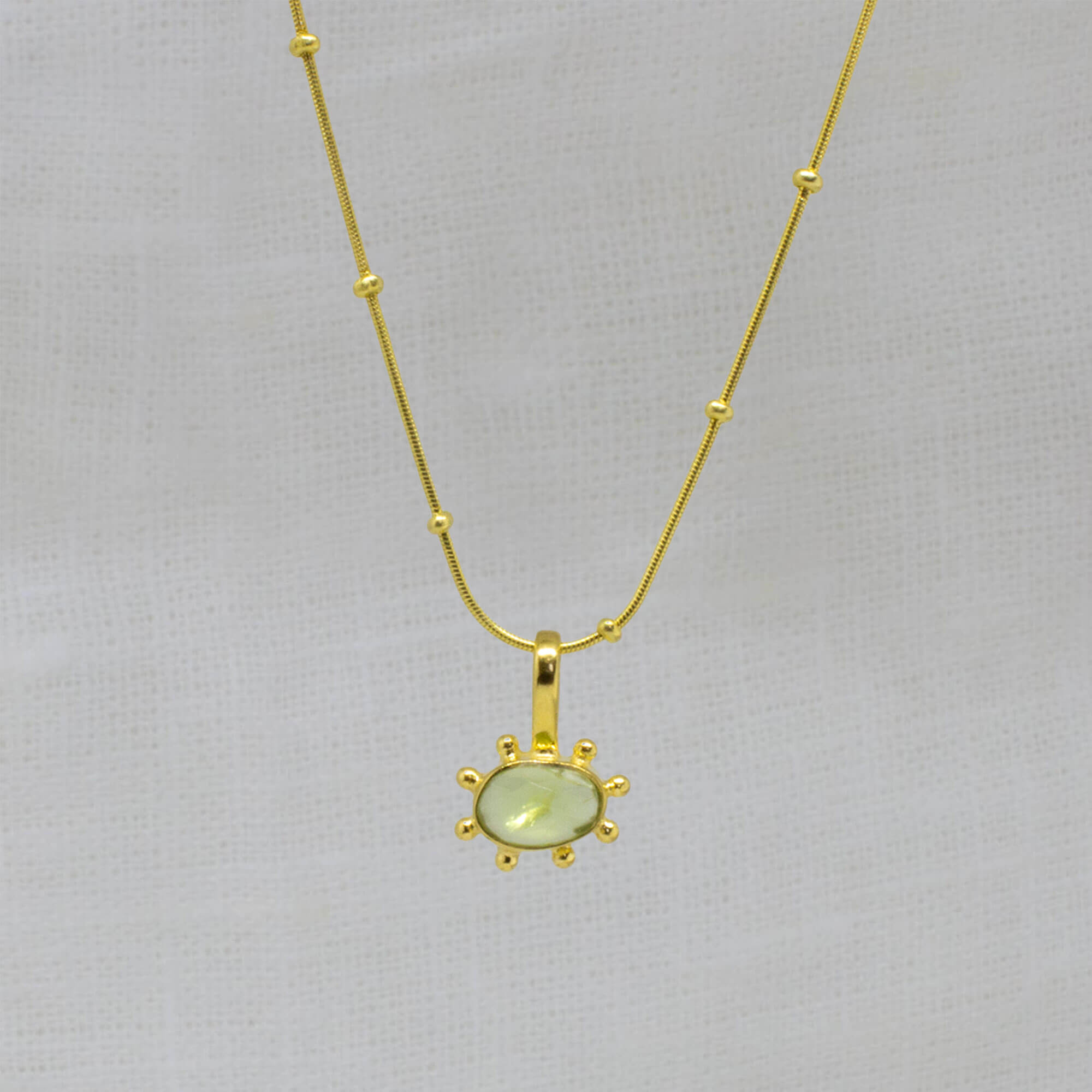 Peridot gemstone irregular pendant necklace in 18k gold vermeil with studded gold snake chain - Beyond Biasa