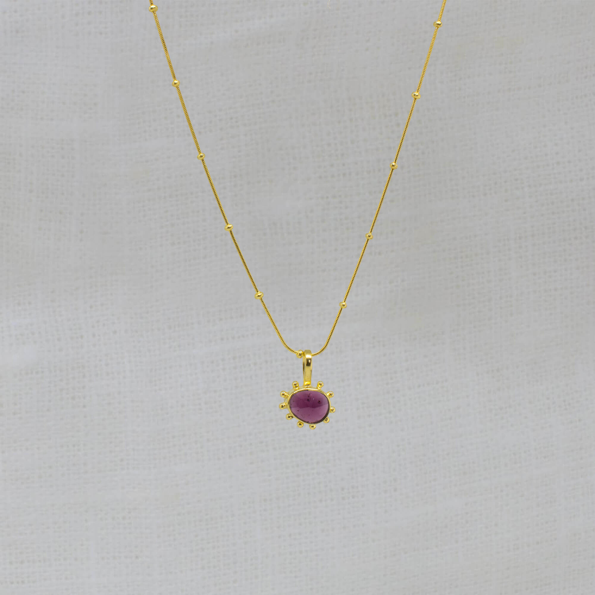 Garnet gemstone irregular pendant necklace in 18k gold vermeil with studded gold snake chain - Beyond Biasa