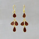 Multi stone chandelier earrings with carved garnet gemstones and 18k gold vermeil hook earrings - Beyond Biasa 