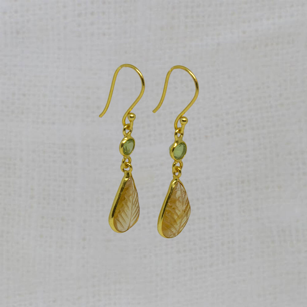 Carved citrine and faceted peridot gemstone earrings in 18k gold vermeil with a simple hook fitting - Beyond Biasa 