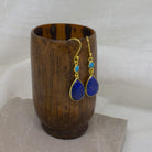 Carved lapis lazuli and faceted turquoise gemstone earrings in 18k gold vermeil with a simple hook fitting - Beyond Biasa 