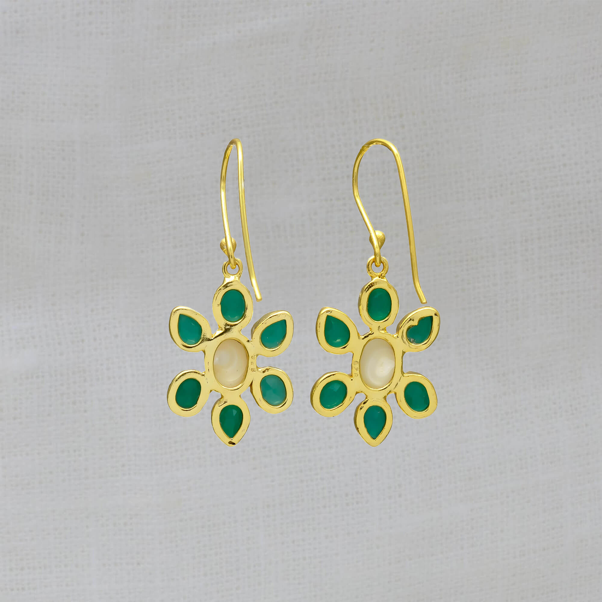 18k gold vermeil flower shaped drop earrings feature a natural freshwater pearl surrounded by 6 green onyx and with a simple hoop fitting