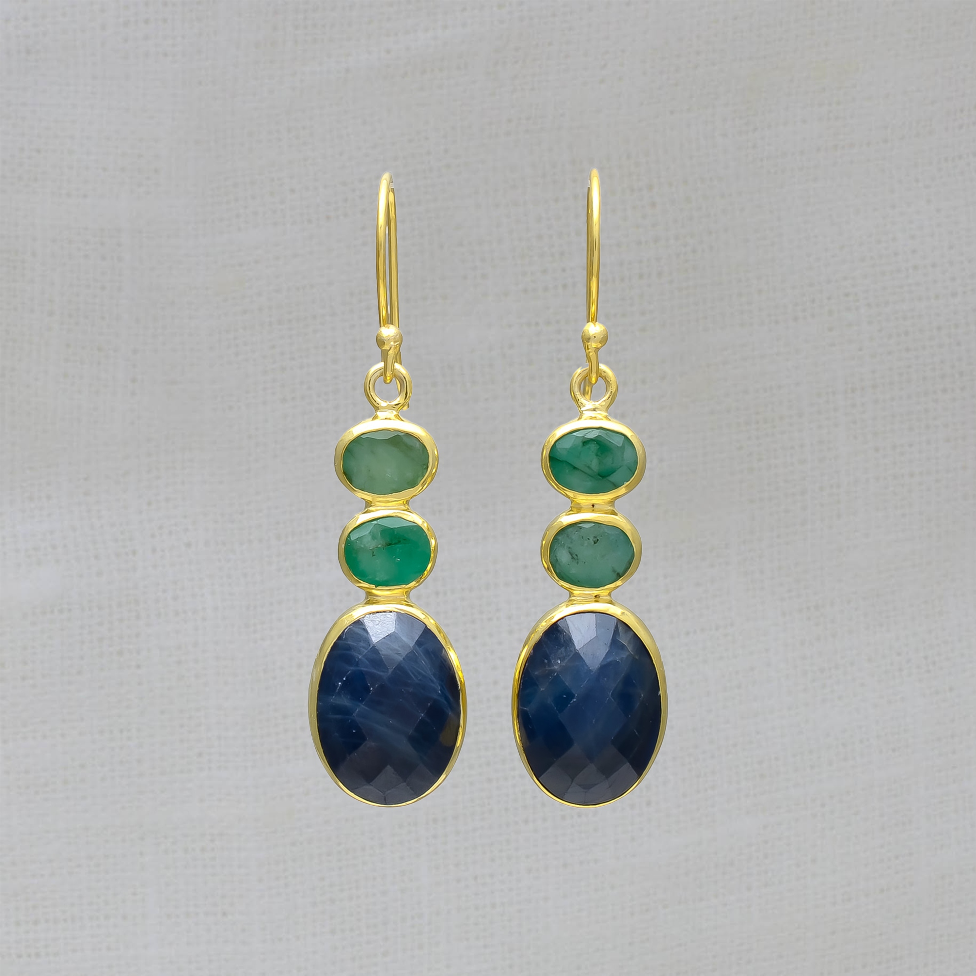 Blue sapphire and green emerald gemstone earrings in 18k gold vermeil with a hook fitting - Beyond Biasa 