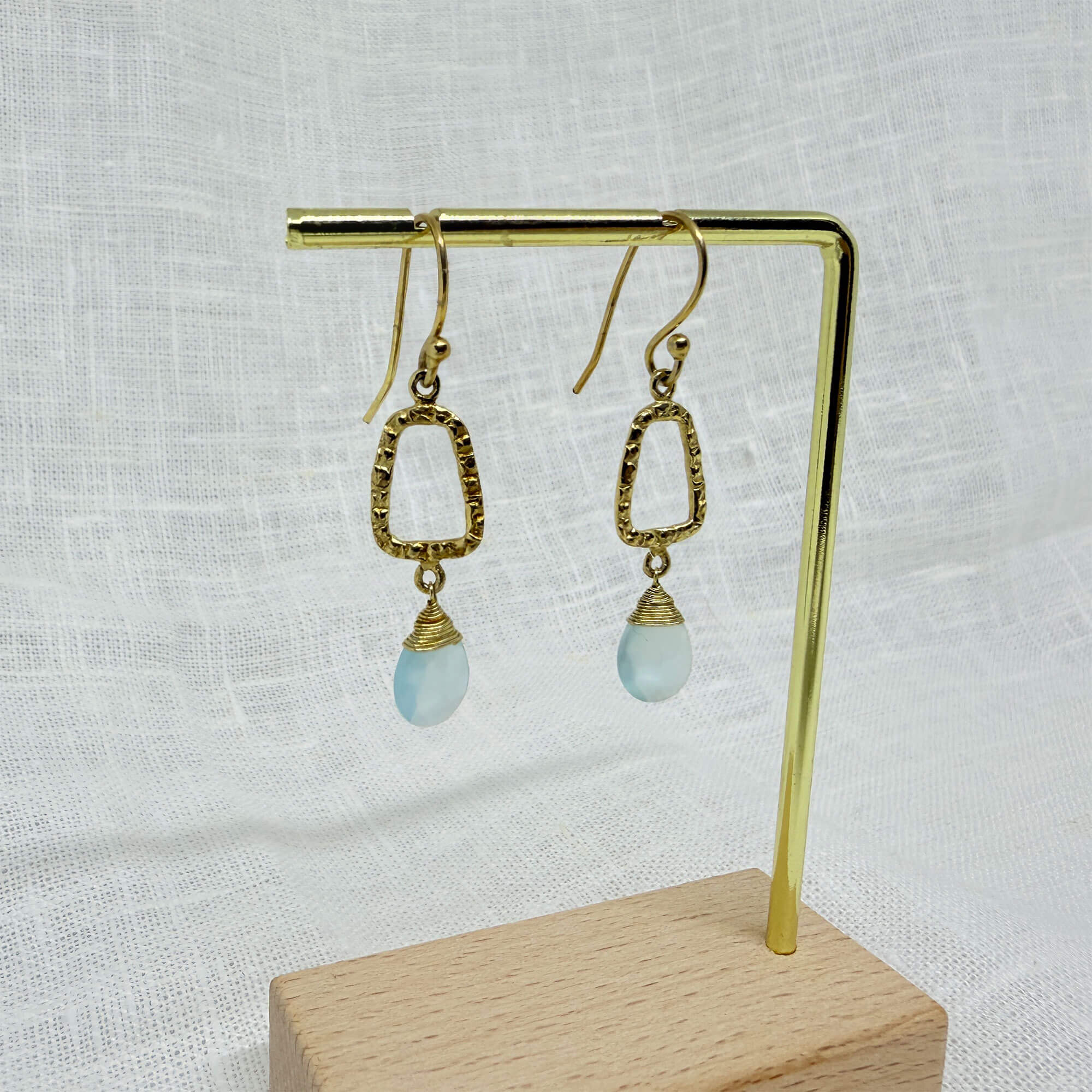 14 Karat Gold Plated Long Hammered Aqua Chalcedony Earrings 14 Karat Gold Plated Long Hammered Aqua Chalcedony Earrings