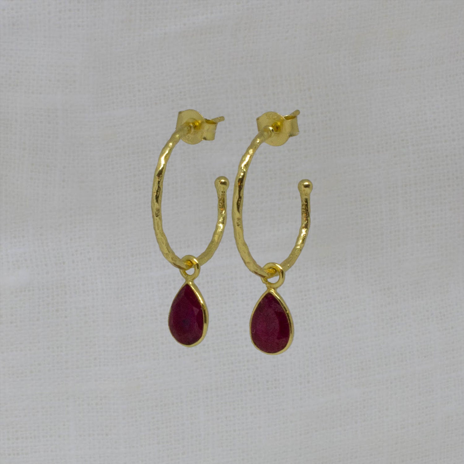 Hammered 18k gold vermeil and gemstone charm hoop earrings in ruby | Beyond Biasa