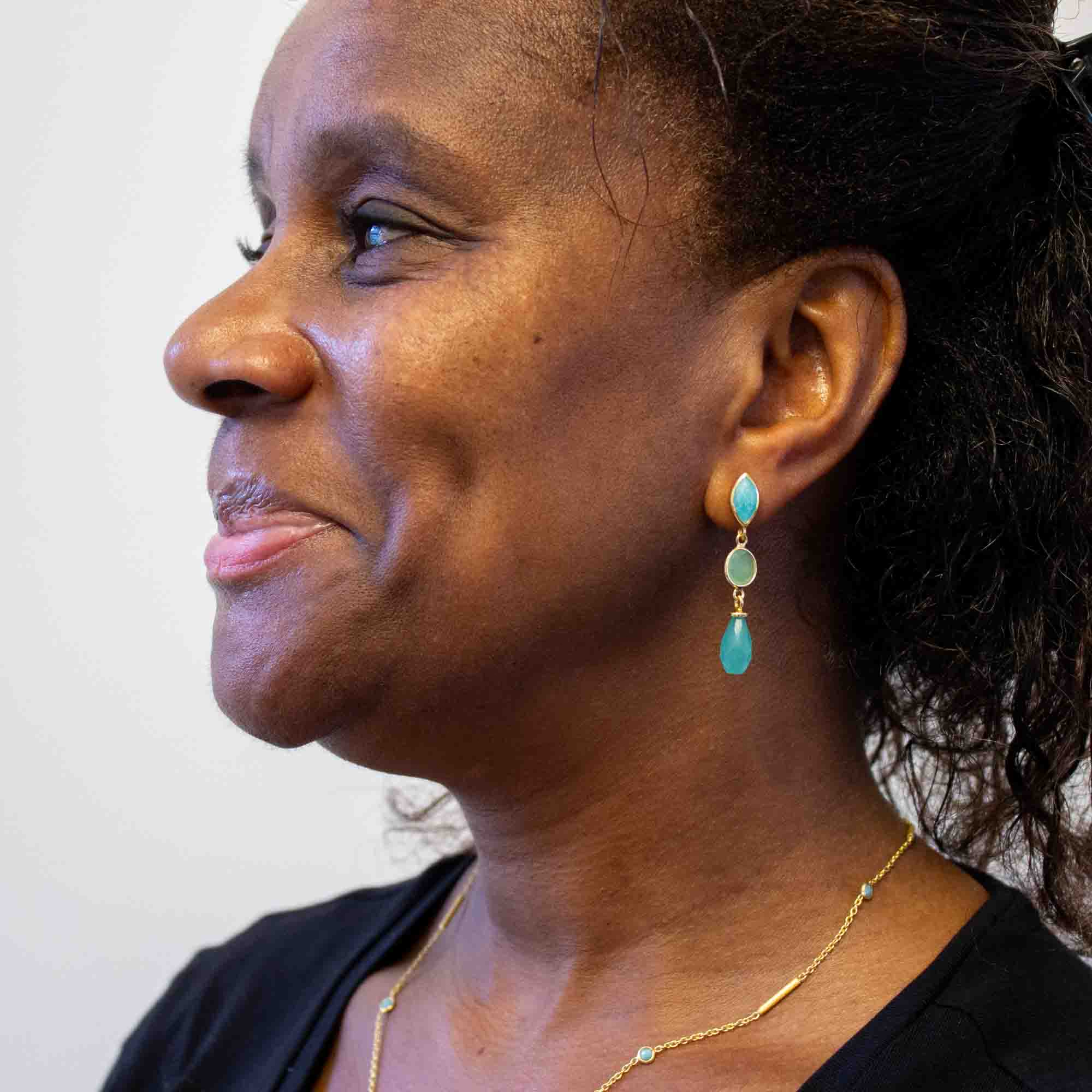 model wearing 18k gold vermeil dangle earrings with a stud fitting - amazonite, prehnite and aqua chalcedony gemstones | Beyond Biasa