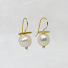 Gold T bar and irregular white pearl drop earrings