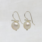Sterling silver and white freshwater pearl T bar drop earrings