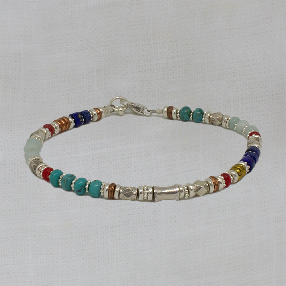Semi-precious gemstone beaded bracelet with turquoise, lapis, amazonite and coral and silver, copper and brass - Beyond Biasa 