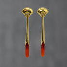 Long statement earrings in 18k gold vermeil with a curved stud and long drop with faceted carnelian gemstone