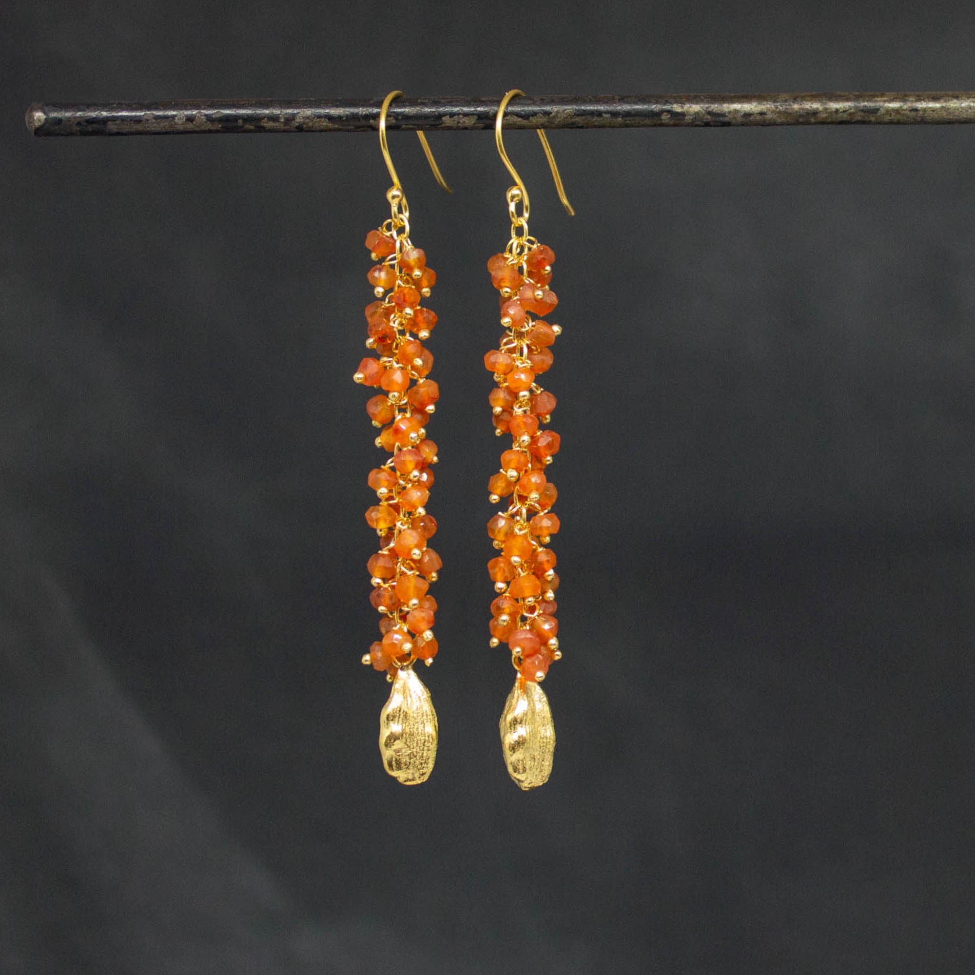 Long carnelian gemstone cluster earrings with 18k gold vermeil cardamon pod charms - Beyond Biasa