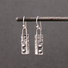 Hammered texture rectangular drop earrings in oxidised sterling silver 