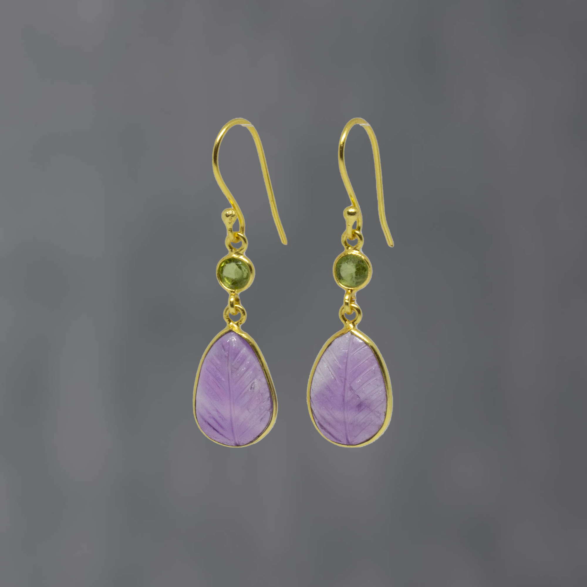 Carved teardrop amethyst gemstone earrings with small faceted peridot and gold vermeil hook fitting - Beyond Biasa 