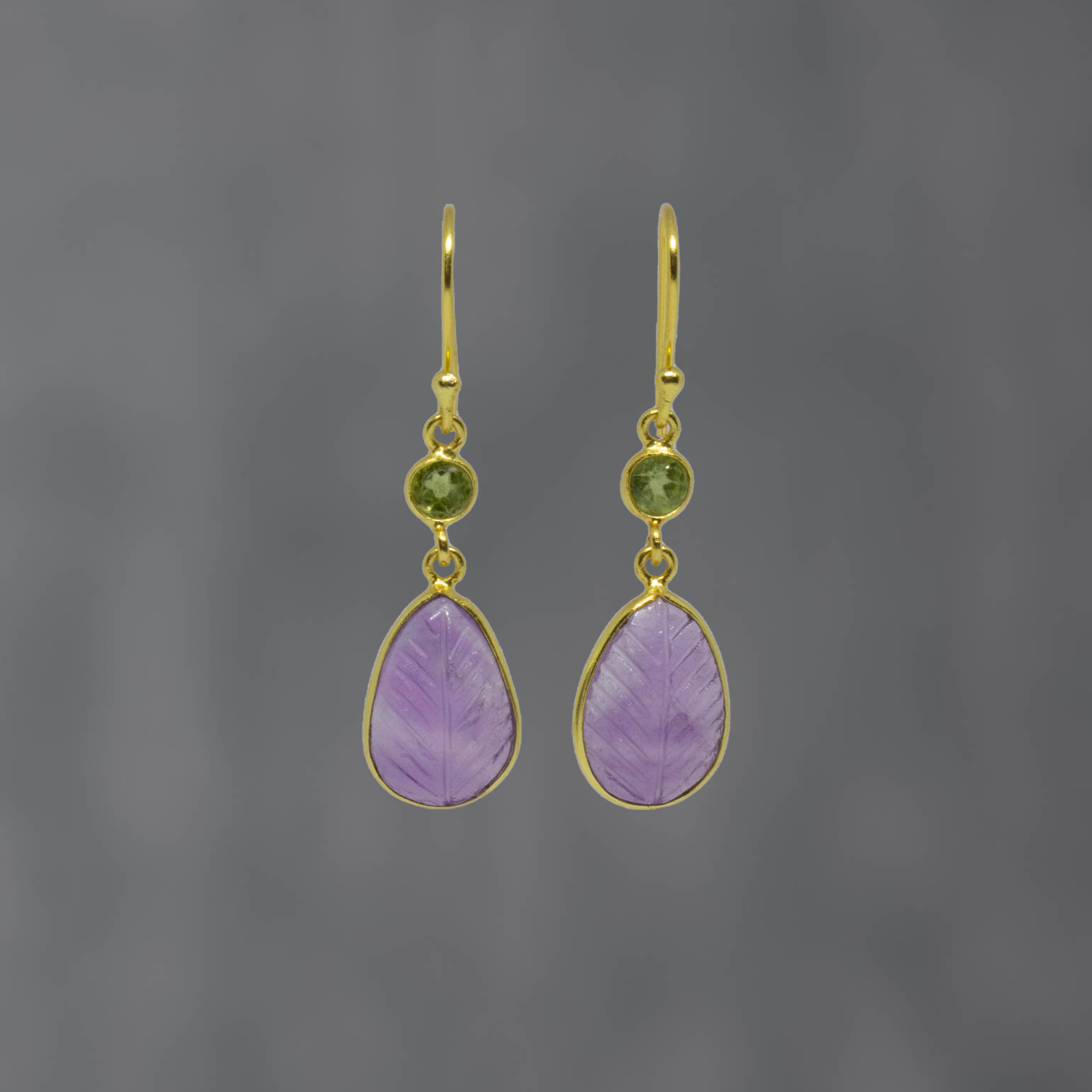 Carved teardrop amethyst gemstone earrings with small faceted peridot and gold vermeil hook fitting - Beyond Biasa 