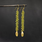 Long peridot gemstone cluster earrings with 18k gold vermeil cardamon pod charms - Beyond Biasa